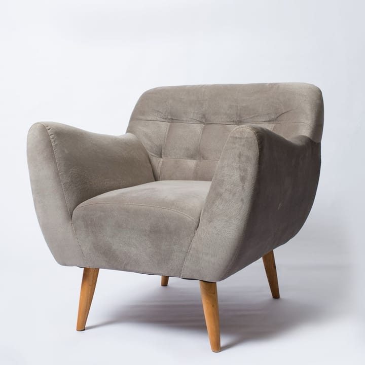 Example photo: Gray upholstered armchair on a plain white background